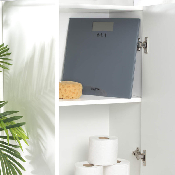 Promotional graphic showing Salter digital bathroom scale with guarantee for weighing babies.