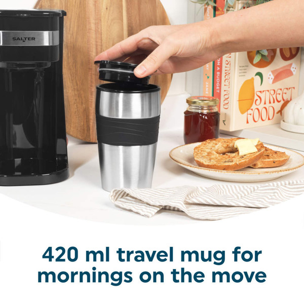 Black Salter filter coffee machine with stainless steel travel mug, power button pressed