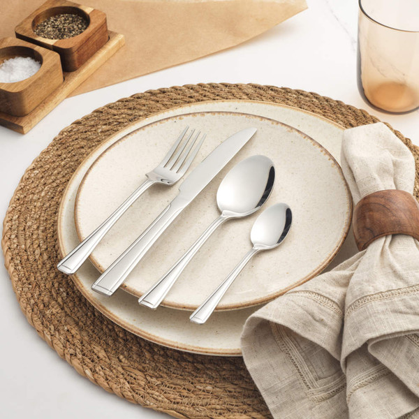 Set of four silver stainless steel cutlery pieces: knife, fork, tablespoon, teaspoon