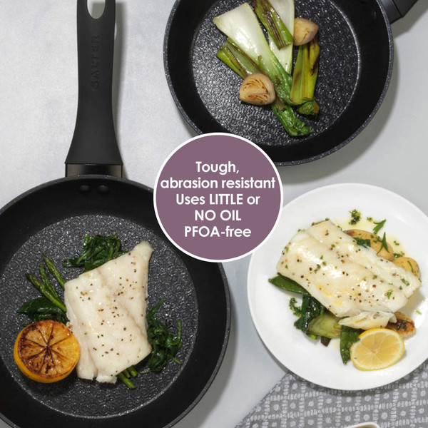 Non-stick frying pans with cooked fish and vegetables, promoting low oil use and PFOA-free coating.