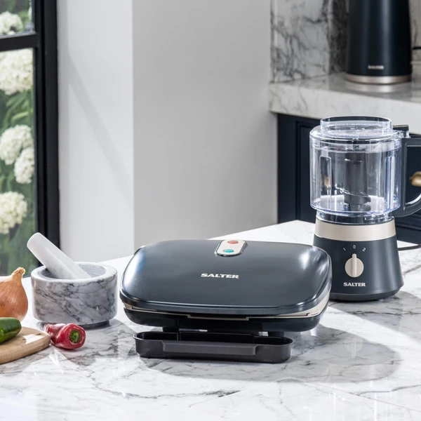 Salter black sandwich toaster and mini food processor on marble kitchen counter