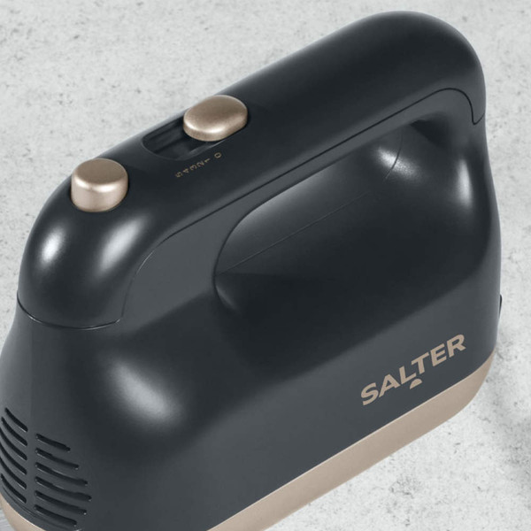Salter black and silver stand mixer with metal bowl and attachments on kitchen counter