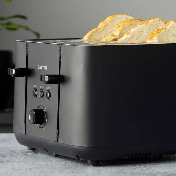 Black 4-slice toaster with controls, showing toasted bread