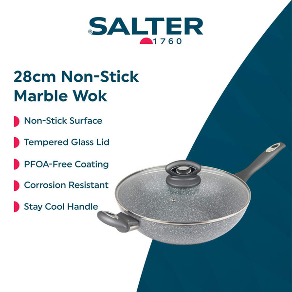 Set of grey speckled non-stick pans and frying pans on modern kitchen surfaces