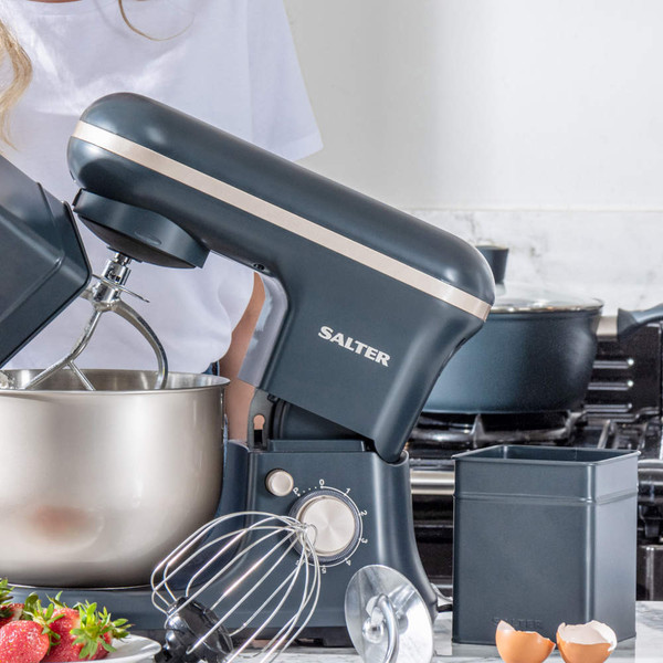 Black Salter stand mixer with mixing bowl and attachments on kitchen counter