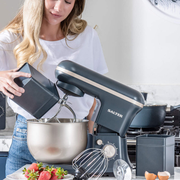 Black and silver Salter stand mixer in use on kitchen counter