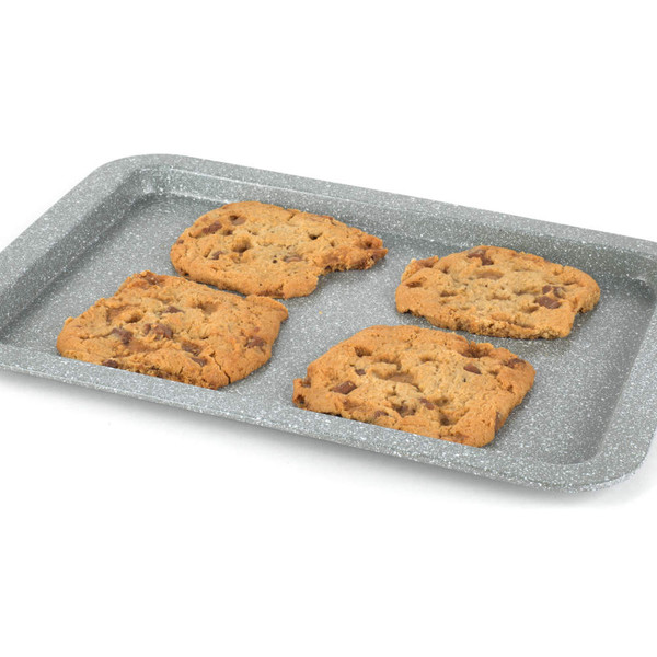 Grey baking tray with four chocolate chip cookies