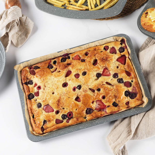 Grey speckled rectangular baking tray shown from the side