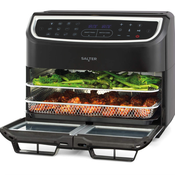Black Salter air fryer oven with digital display, open door, cooking vegetables and chicken inside