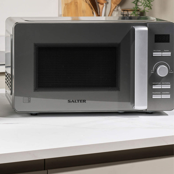 Grey Salter microwave oven with digital controls on kitchen counter
