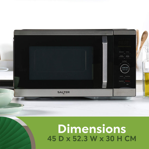 Black and silver Salter microwave on kitchen counter, dimensions 45 D x 52.3 W x 30 H cm shown