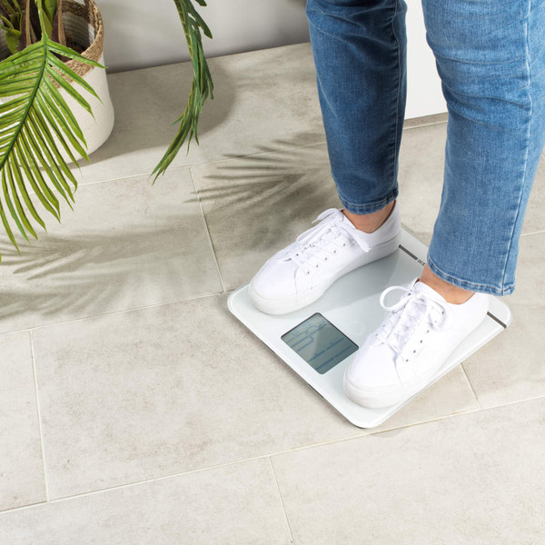 White digital bathroom scale with large backlit display, Salter branding