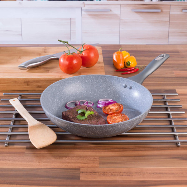 Grey stone-effect frying pan on wooden worktop, shown empty for product listing.