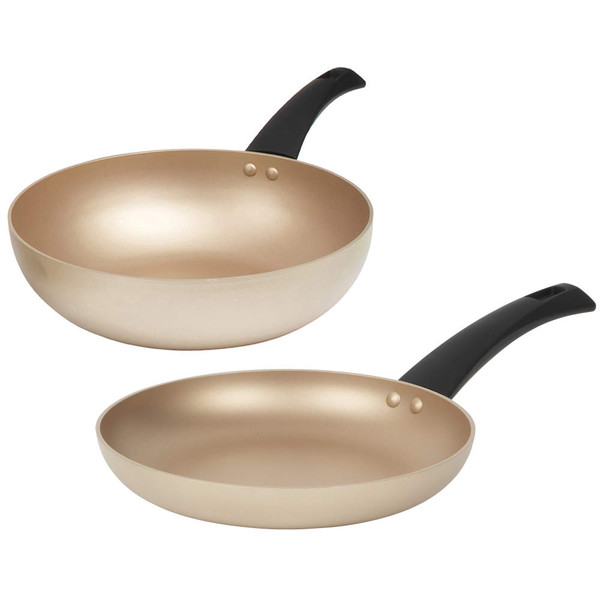 Set of two gold frying pans with black handles, shown side by side