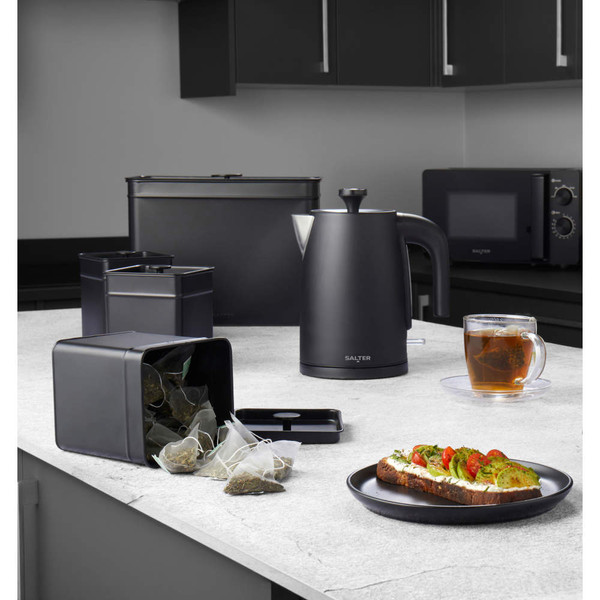 Set of four matte black metal kitchen storage tins by Salter, shown from the front.
