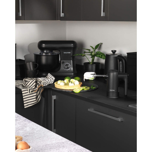Salter black stand mixer and hand mixer on kitchen counter with key lime pie