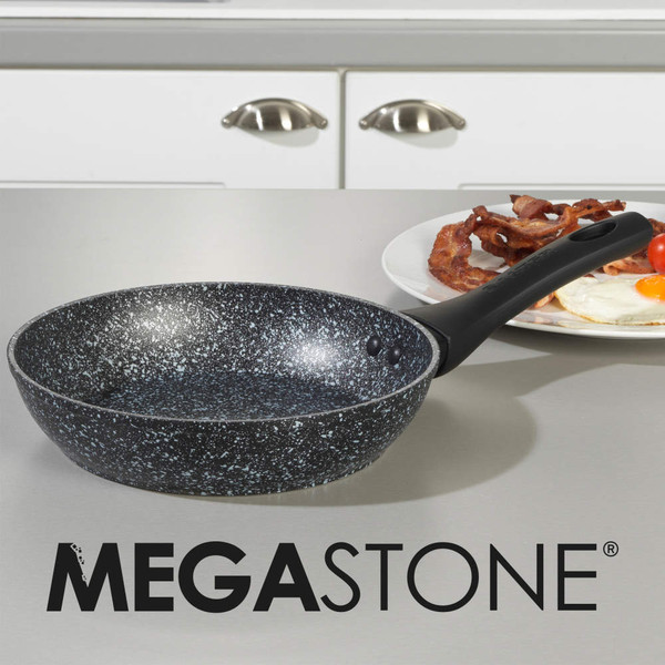 Black and white speckled non-stick frying pan with black handle on kitchen counter