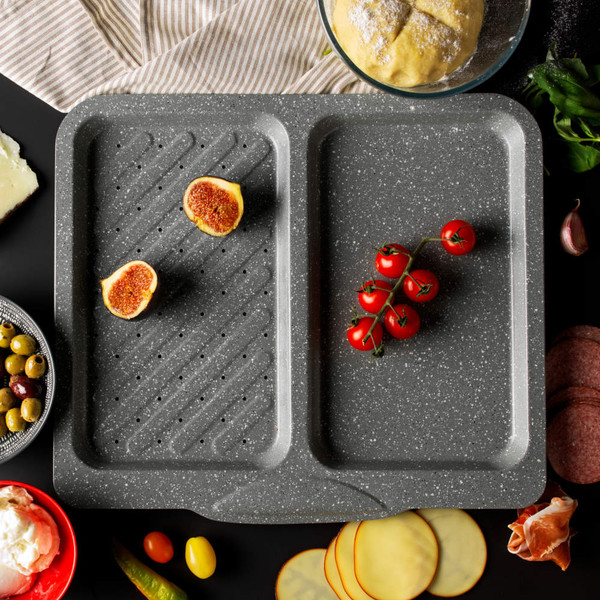 Grey two-section oven tray shown with figs and cherry tomatoes, suitable for baking or roasting.