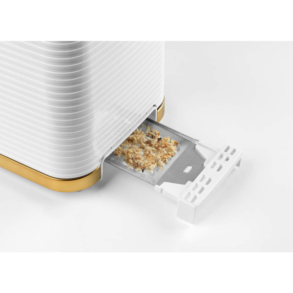 White toaster crumb tray partially open with crumbs visible, showing easy-clean feature