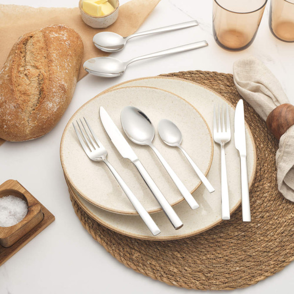 Stainless steel cutlery set showing sizes for knife, fork, spoon and teaspoon.