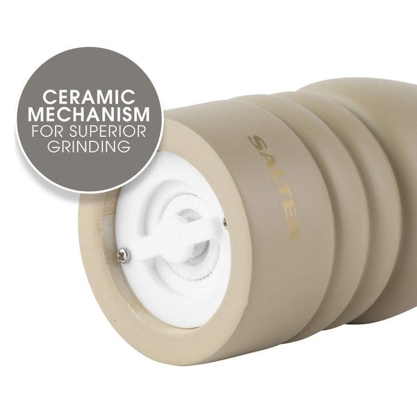 Beige Salter mill with ceramic grinding mechanism close-up
