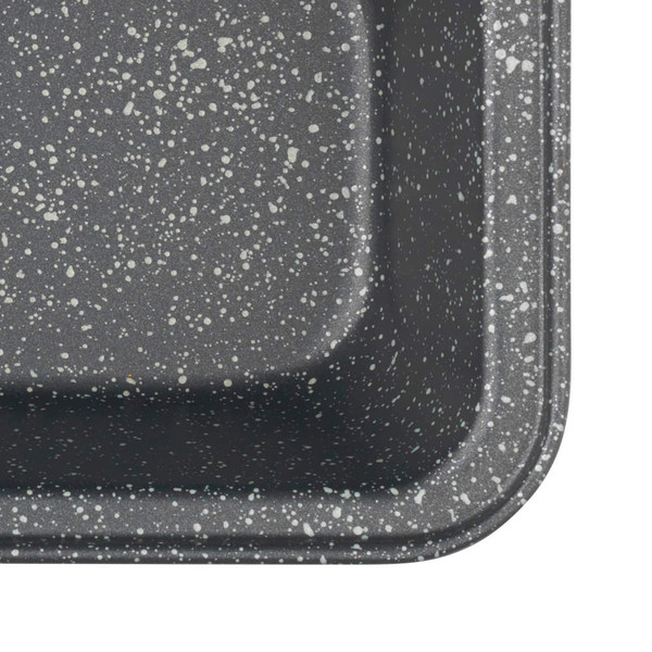 Grey speckled enamel roasting tray, close-up of corner showing pattern.