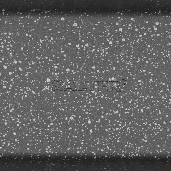 Black and white speckled rectangular loaf tin, viewed from the side.