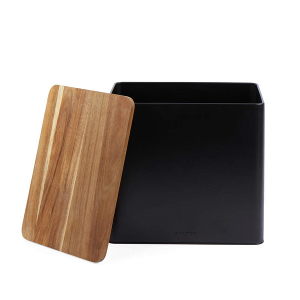 Black square storage canister with wooden lid, lid resting beside container
