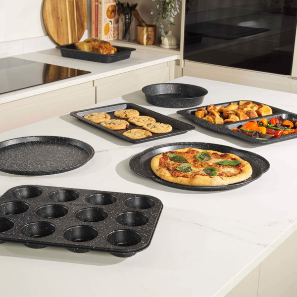 12-cup black speckled non-stick muffin tray shown at an angle