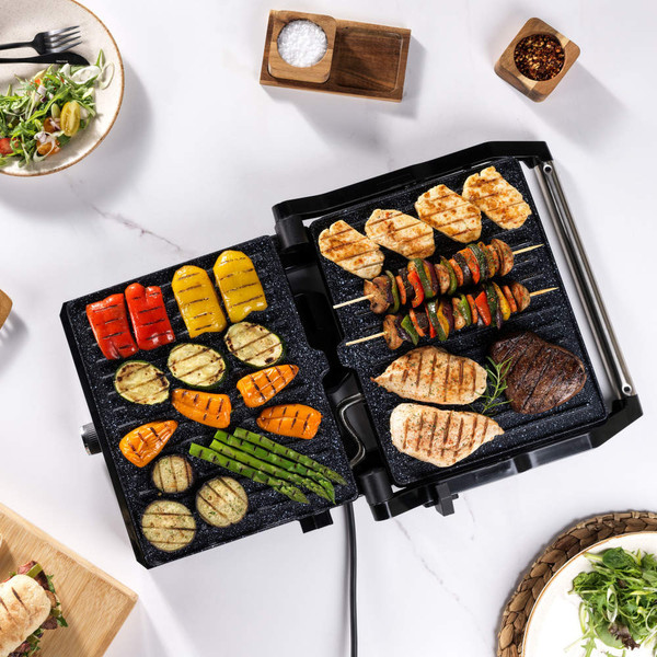 Compact Megastone grill with cool-touch handles and drip tray Compact Megastone grill with cool-touch handles and drip tray
