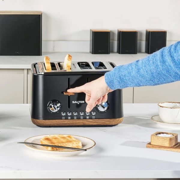 Black electric kettle with wood-effect handle and lid, shown upright on white background.