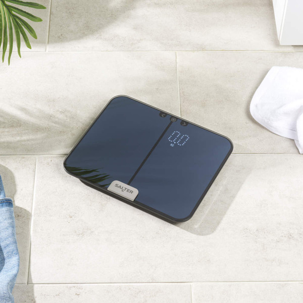 Bathroom scale with hidden white LED display, switch between kg and st/lb units.