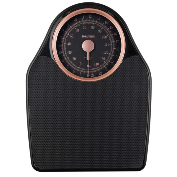 Black and copper mechanical bathroom scale with large dial, shown from above