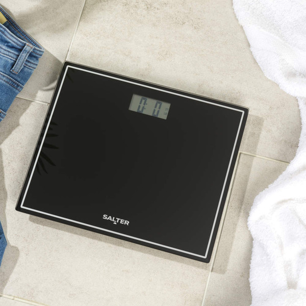 Black digital bathroom scale with Salter logo, front view