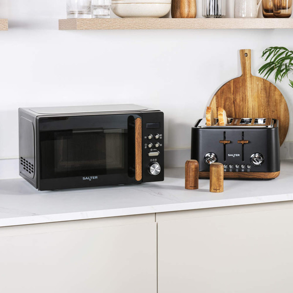 Black Salter microwave and toaster with wood accents on kitchen counter