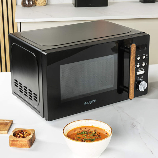 Black digital microwave with wood-effect handle, 20L capacity, Salter brand, on white background