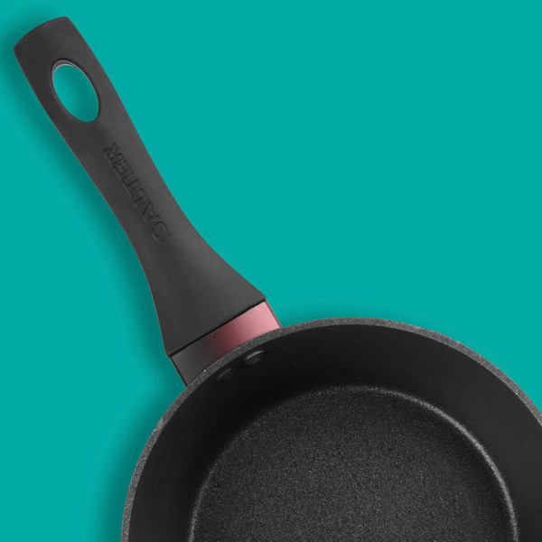 Non-stick black saucepan with Salter handle, angled view on teal background