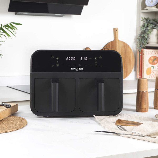 Black digital dual air fryer with touch controls and twin baskets, front view