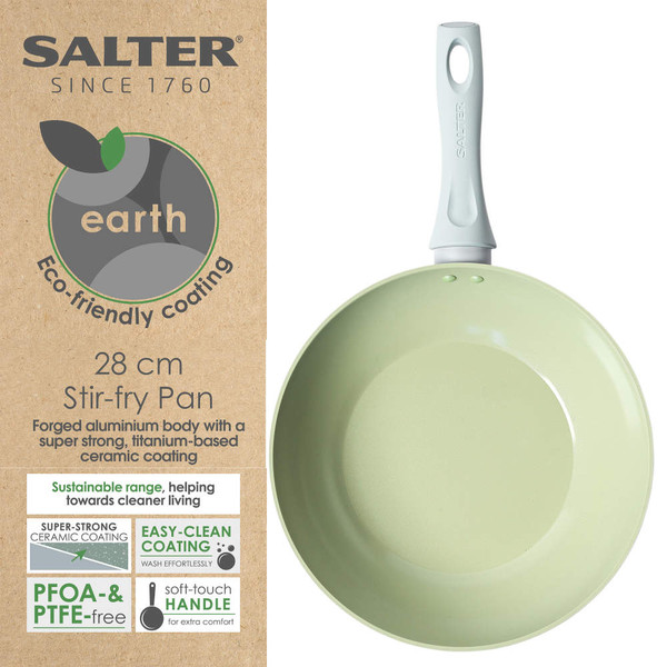 Salter light grey wok with green non-stick interior, shown on wooden board in modern kitchen