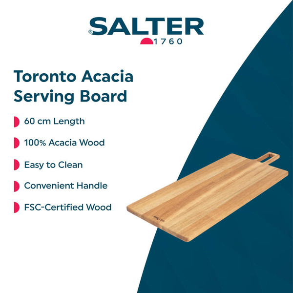 Large natural wood serving board with handle on kitchen worktop