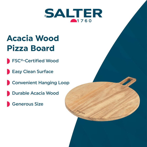 Hand using pizza cutter to slice homemade pizza with rocket on wooden board