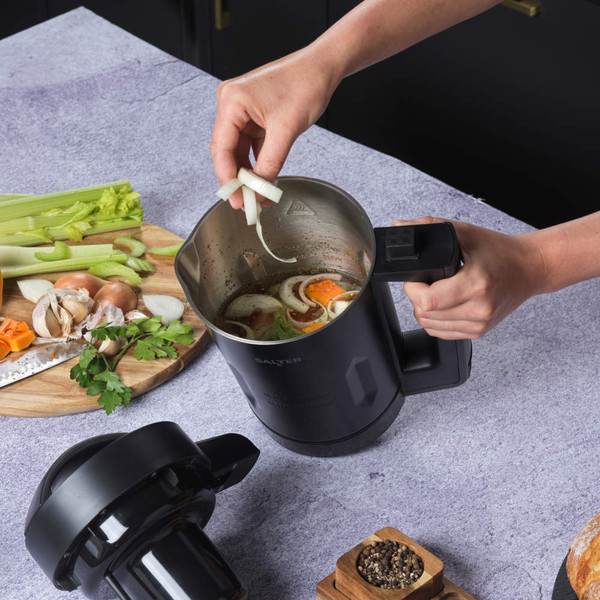 Black stainless steel jug kettle shown from above, highlighting open interior and handle.
