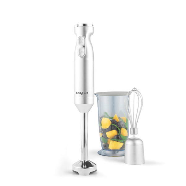 Silver hand blender set with whisk and blending jug containing fruit