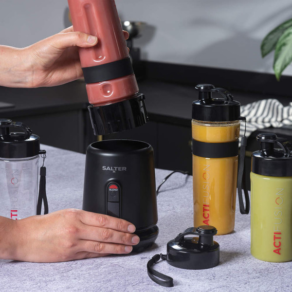 Salter portable blender with smoothie bottle, shown blending assorted drinks