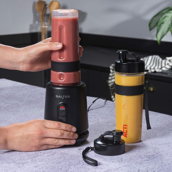 Salter ActiFusion personal blender with red smoothie bottle, shown on kitchen worktop