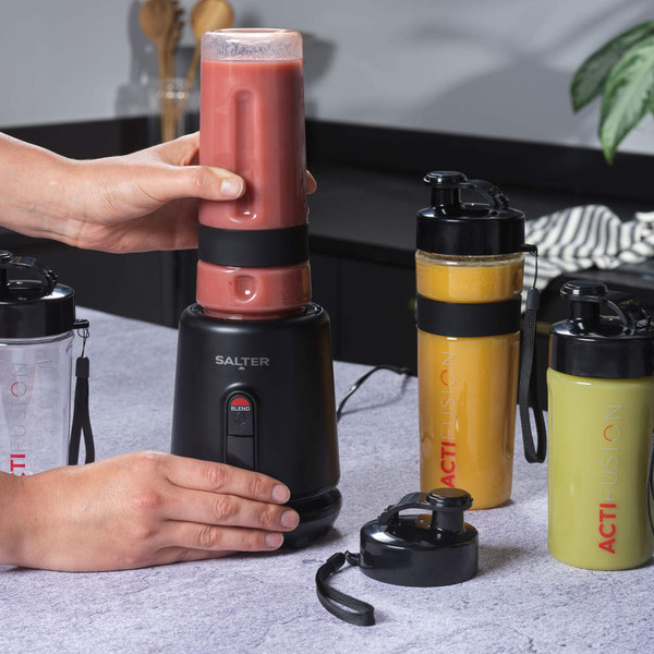 Salter ActiFusion personal blender with red smoothie bottle, shown on kitchen worktop