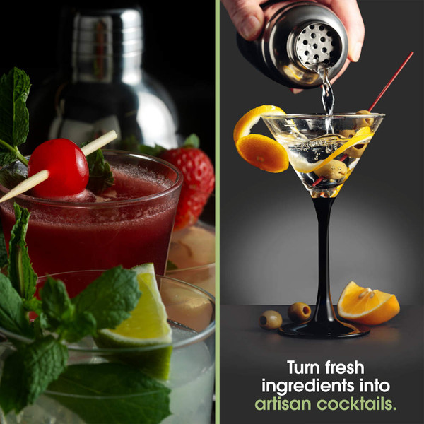 Black blender with jug of ice, lime and mint, cocktail glass and bar tools on black background