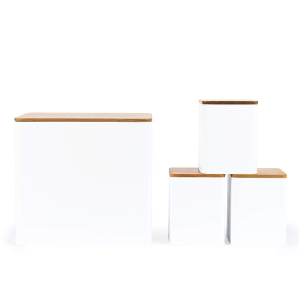 Set of four white kitchen storage canisters with bamboo lids, shown in different sizes.