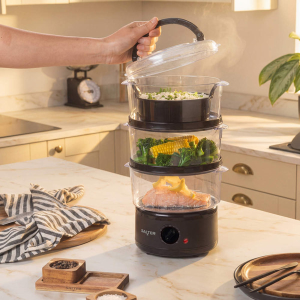 Salter Kuro Food Steamer in retail box packaging, showing steamer with food tiers.