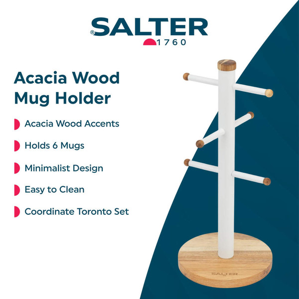 White electric kettle with wood-effect handle beside speckled ceramic mugs on kitchen counter